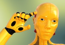Nell'immagine un robot umanoide si tocca la testa con la mano - Smart Marketing
