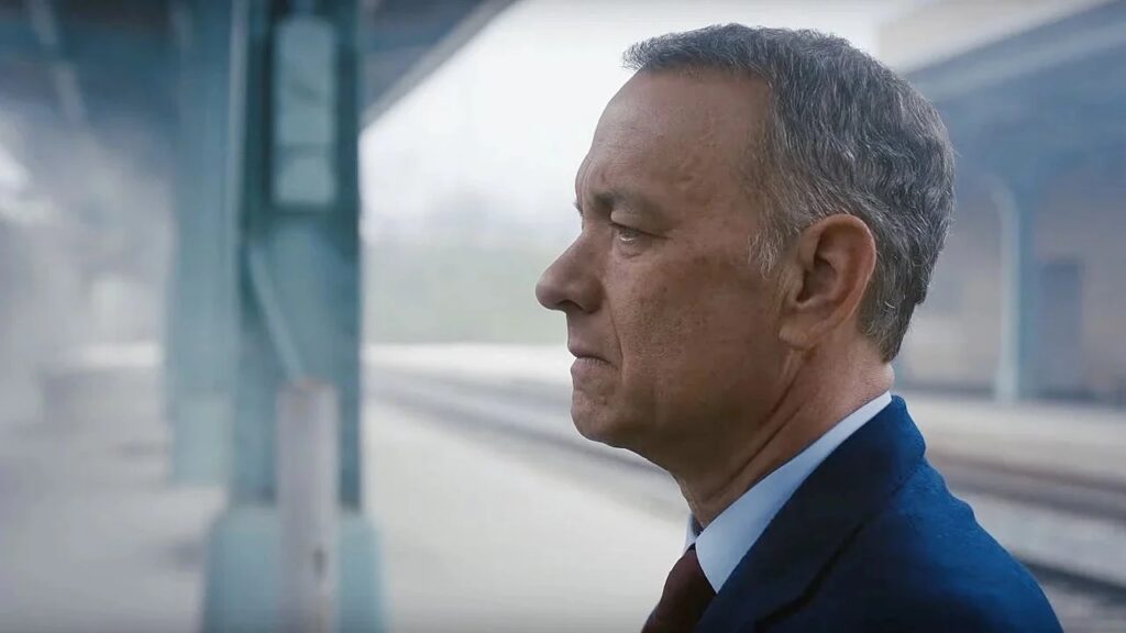 Nell'immagine Tom Hanks in una scena del film "Non così vicini" - Smart Marketing