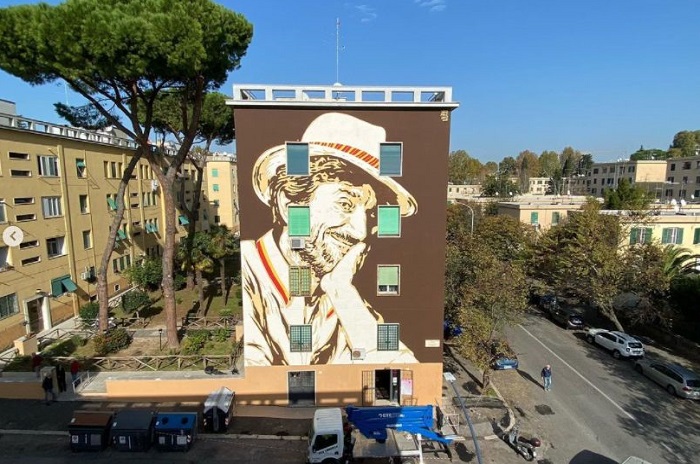 Nell'immagine il murales dedicato a Gigi Proietti - Smart Marketing